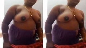 Tamil wife squeezes husband's chest in steamy video