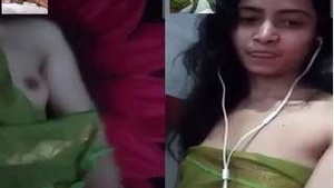 Beautiful girl bares her body in a video call