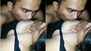 Lover enjoys sucking on girlfriend's breasts