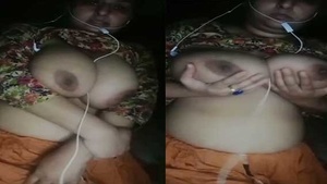 Pakistani girl flaunts her large breasts in a village setting