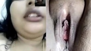 Horny woman shows off her breasts and pussy in video call
