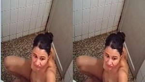 Beautiful Indian girl taking a bath