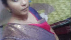 Indian girl flaunts her ample breasts