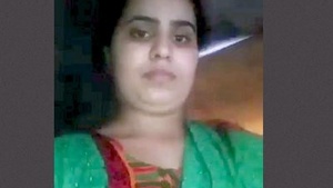 Watch a curvy bhabhi with huge breasts and a wet pussy in this video