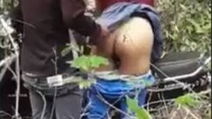 Passionate couple has sex in the woods
