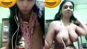 Desi beauty with big boobs teases in front of the camera