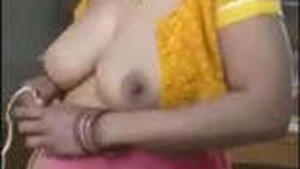 Indian housewife changes outfits in amateur video