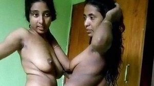 Naked Indian twin sisters explore lesbian desires in video