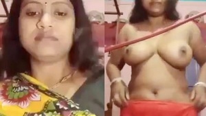 Desi bhabhi with an amazing figure strips naked in HD video