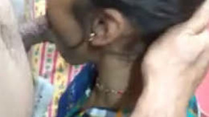 Indian wife gives a deepthroat blowjob to her husband