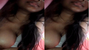 Exclusive video of a cute Indian girl exposing her breasts