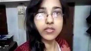 A charming Indian girl strips naked and teases the camera