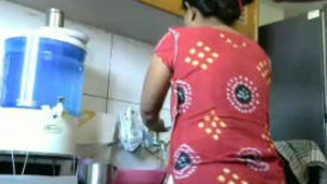 Steamy kitchen romance with a couple in a full video