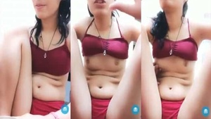 Young and beautiful girl flaunts her small breasts on camera