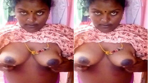 Mallu bhabhi flaunts her big boobs in a titillating video