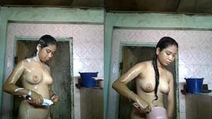 Indonesian hottie indulges in shower bathing and masturbation