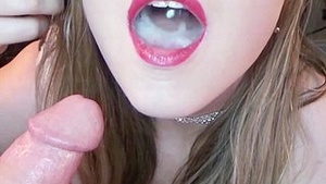Watch a hot babe take a load in her mouth from a POV perspective