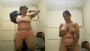 Sri Lankan MILF flaunts her big boobs in a nude video