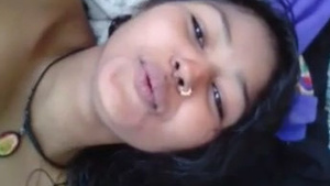 Neha, a sexy Indian girl, pleasures herself with her fingers in a selfie video