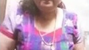 Aunty unleashes her sensuality by opening her dress