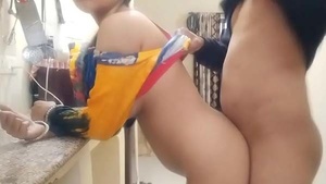 Desi couple's steamy kitchen sex video