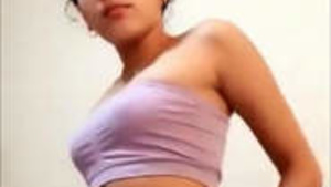 Teen Latina gets naked and exposes her sweet body