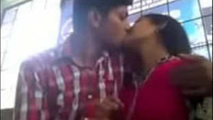 Indian couple shares a sweet smooch in front of the camera