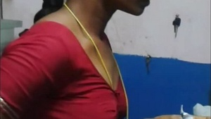 Tamil wife prepares for a steamy encounter in a movie
