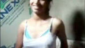 Cute desi girl shows off her curves in a video clip