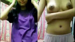 Schoolgirl flaunts her body in a steamy video