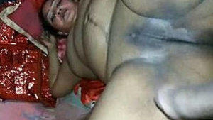 Indian aunt with large breasts gives her husband a hard time in bed