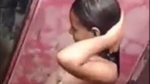 Watch a college girl in India get naked in a bathroom video