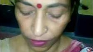 Desi aunt gives oral pleasure to her son's friend