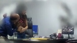 Hidden camera captures Indian office workers in steamy sex video