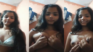 Indian village girl flaunts her natural breasts in a seductive video