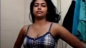 Cute Indian girl strips naked in the bathroom