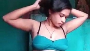 Naughty Indian girl strips and shows off her smelly pussy in solo video