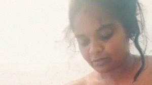 Mallu aunty Pooru's steamy solo performance in the bathroom