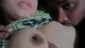 Busty girl gives a blowjob to her boyfriend