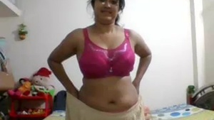 Indian GF in pink lingerie gets naughty in a steamy video