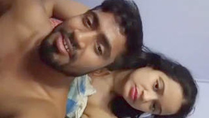 Indian woman squeezes her nipple in solo video