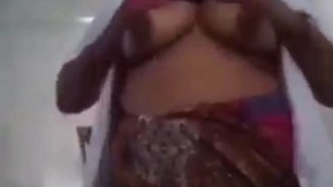 Big-boobed nurse from India demonstrates her skills in a steamy video
