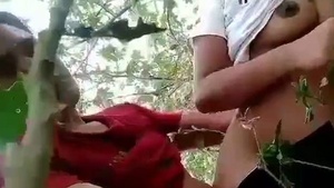 Bhabi moans with pleasure while having sex in the jungle