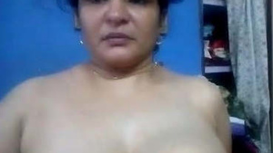 Busty bhabhi's seductive performance with her perky breasts and erect nipples
